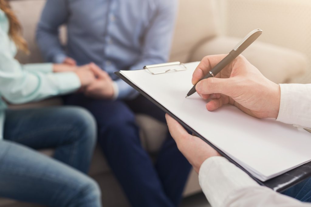 Unrecognizable couple at therapy session